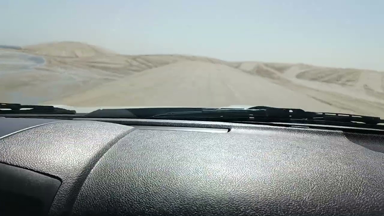 Dunebashing. Doha desert safari inland sea Qatar 