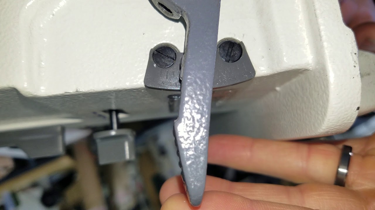 How to change a broken reverse lever on a newer Singer 20U, Consew 2053, or similar machine.
