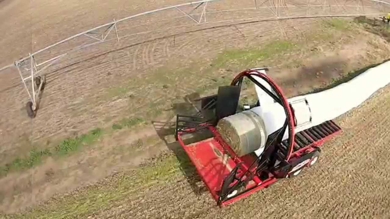 Hauling and Wrapping round bales Stinger style