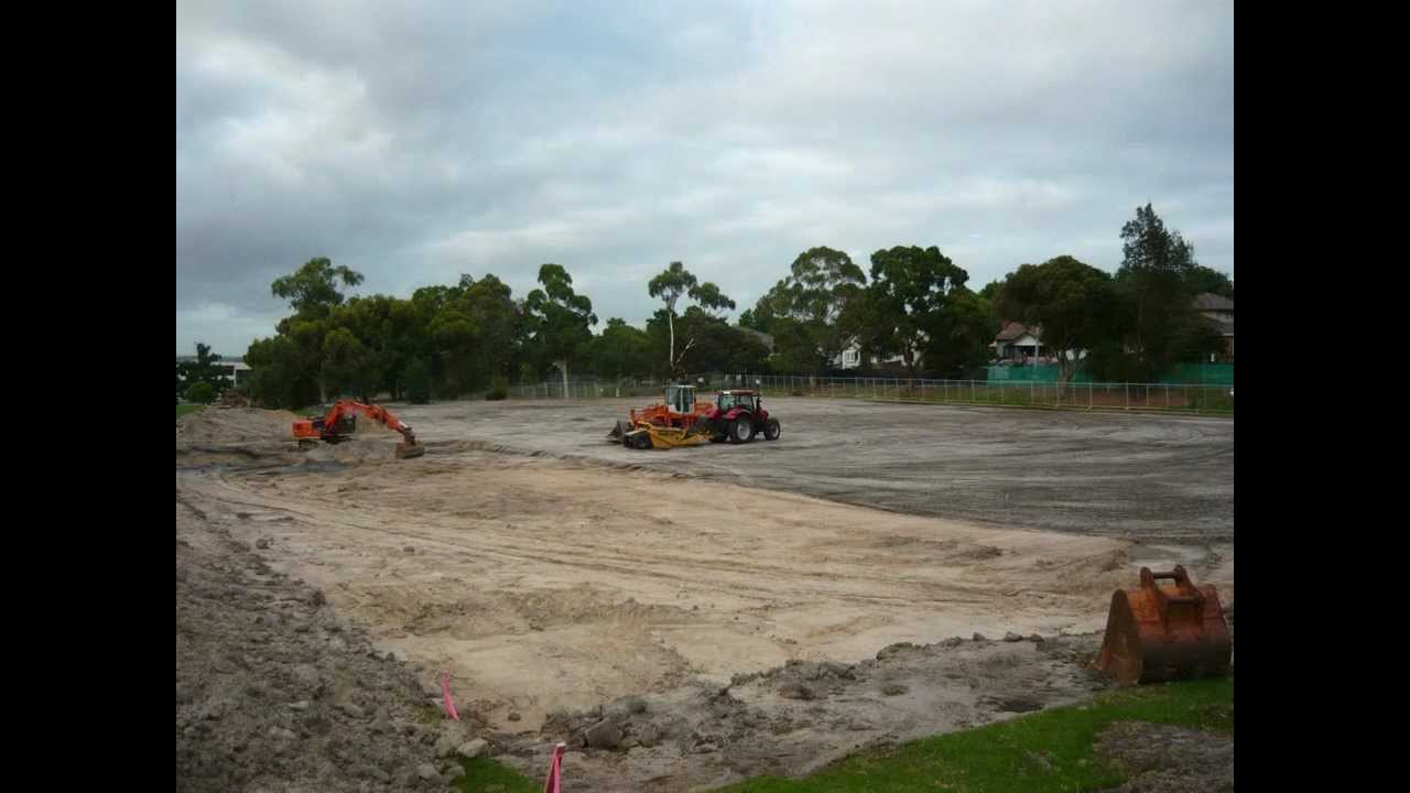 Synthetic grass hockey pitch installation