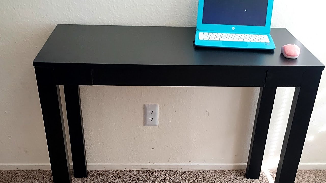 Step by step assembly on Ameriwood Home desk. 