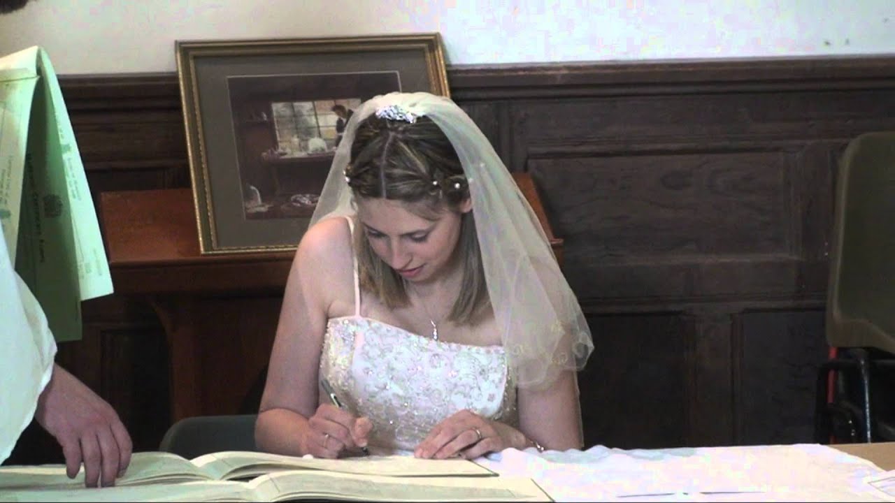 Luke and Laura's Wedding signing the register