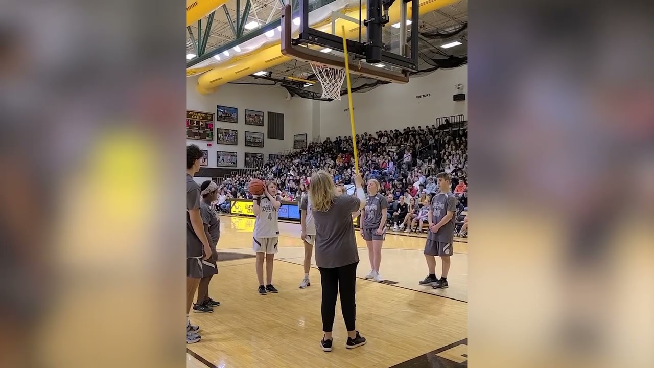 Michigan girl who is blind makes shot during basketball game
