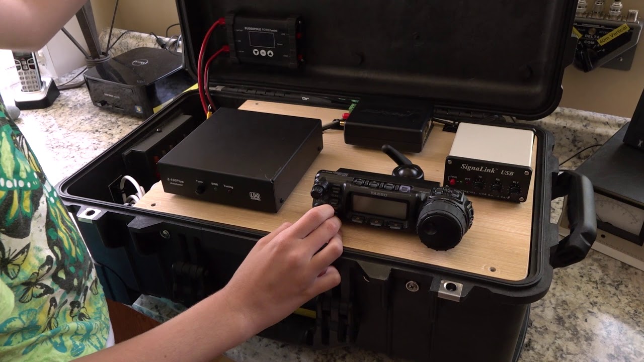 KM4IPF Shows the Shack-In-A-Box Ham Radio Go Box that She Built