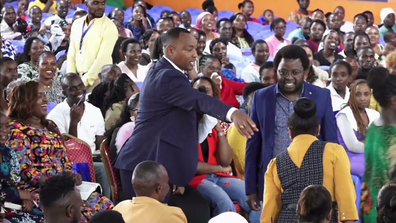 Bishop Ben of JCM gives 20,000 to JCM pregnant twin woman to buy child clothes