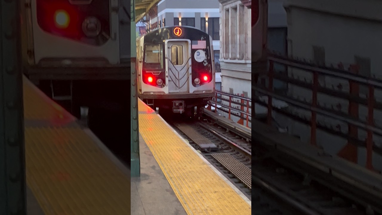R160 (J) Train leaving unidentified station