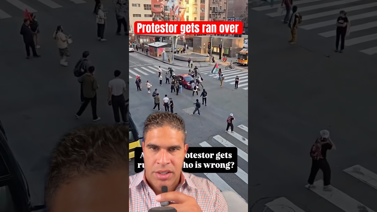 Protestor gets ran over after blocking the car in the street. Who is wrong here?