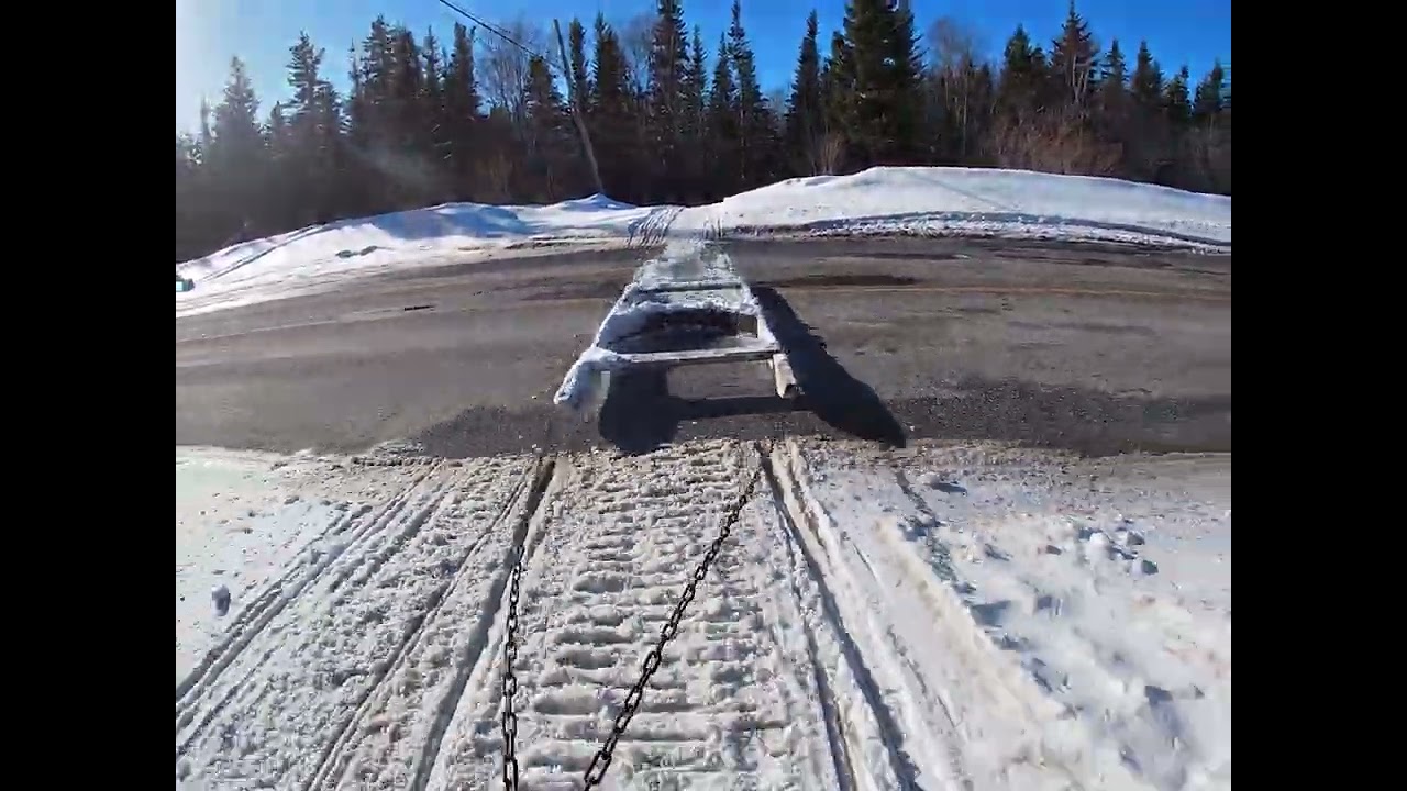 Grooming our snowmobile trail