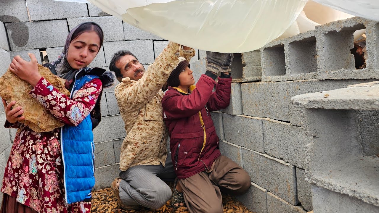 A rainy day for Leila's family and making a tent