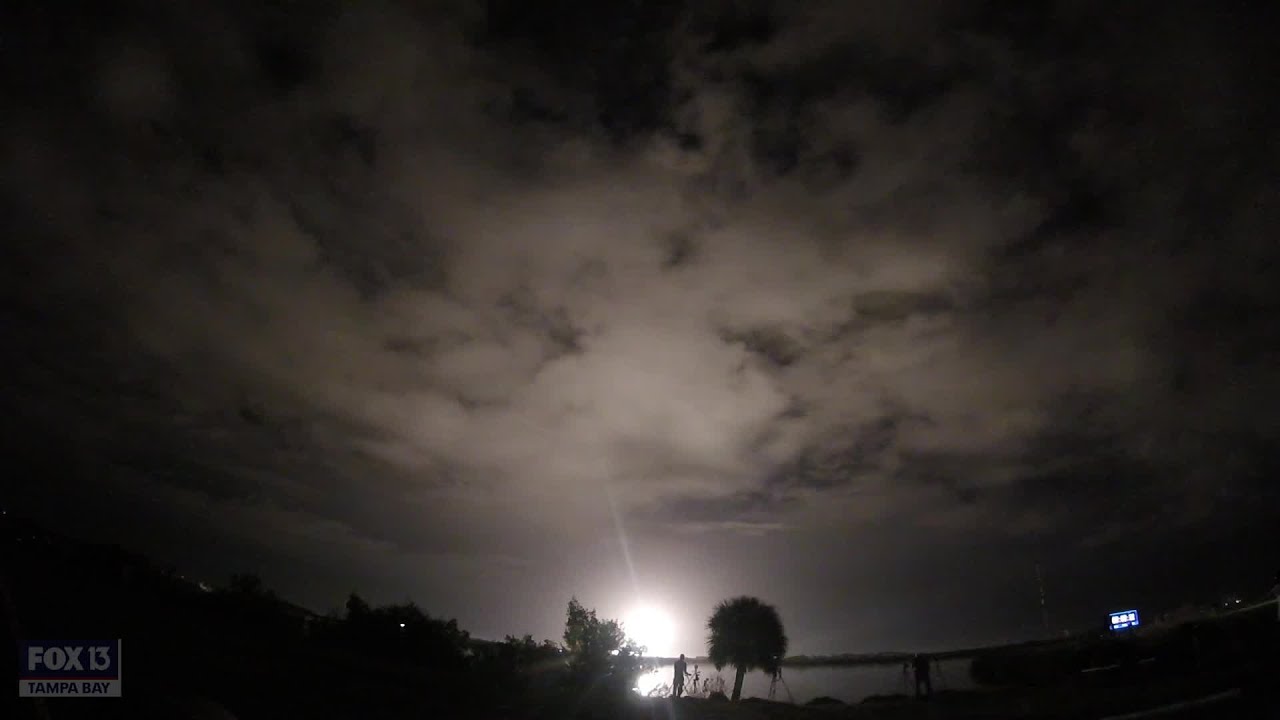 Falcon 9 rocket lights up the clouds