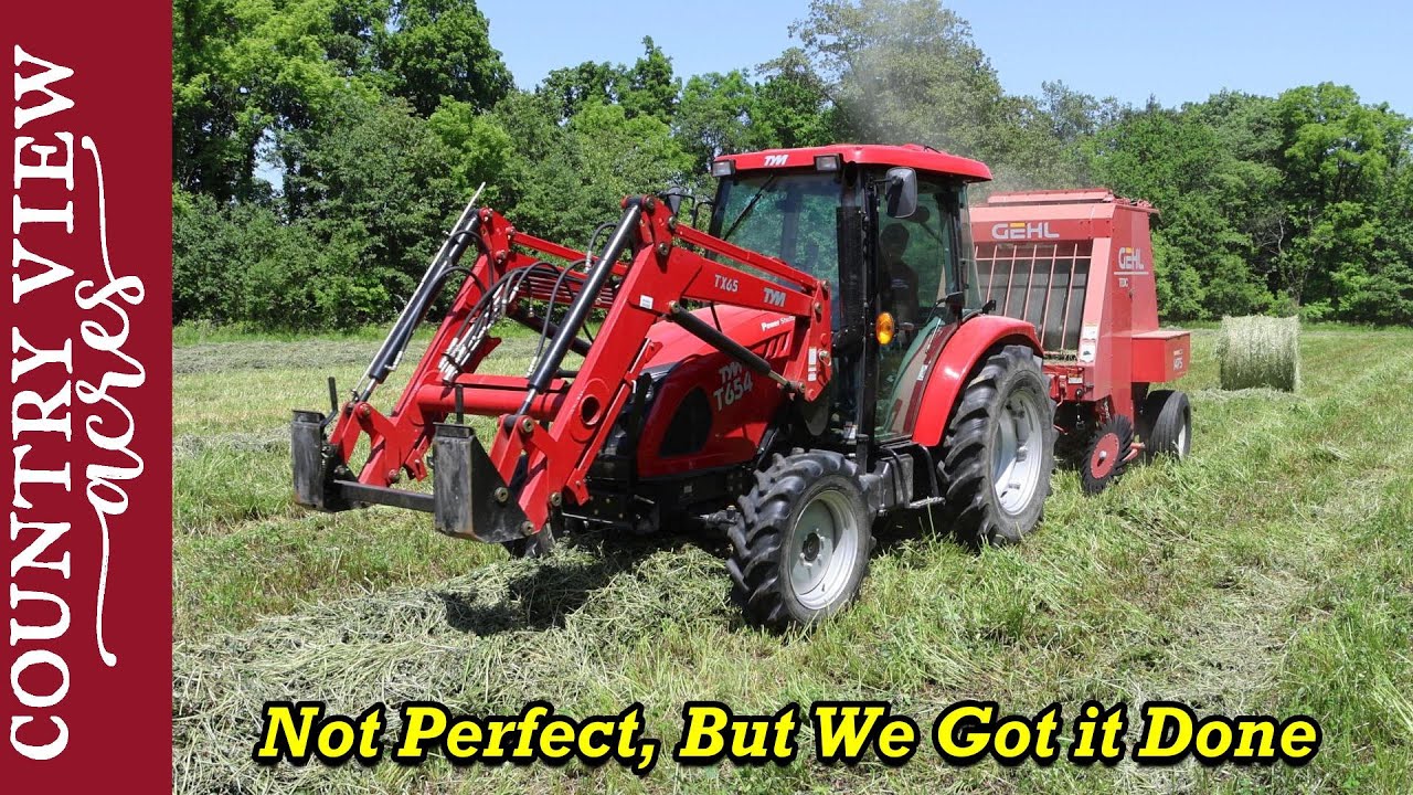 Baling Hay!  The Square baler still isn't working very good.  So we finished by making Round bales