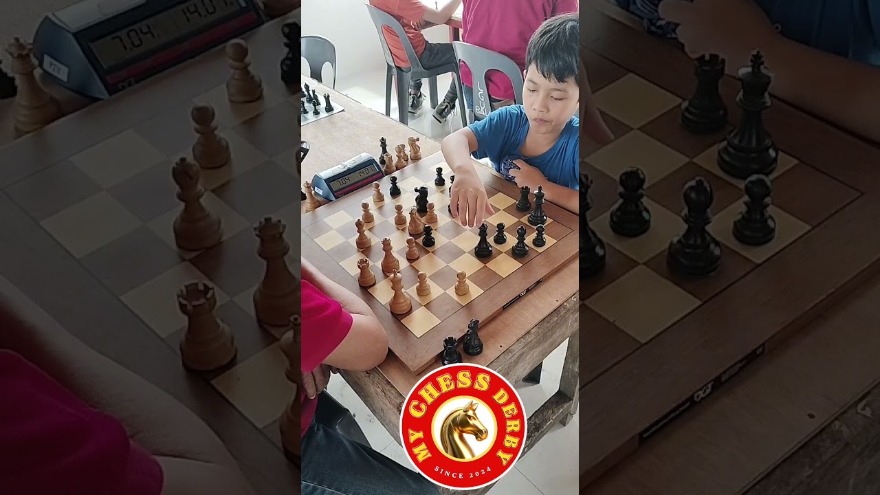 Mario Arroyo versus Kyros Andrei Magsalay playing the crucial endgame of Pirc Defence