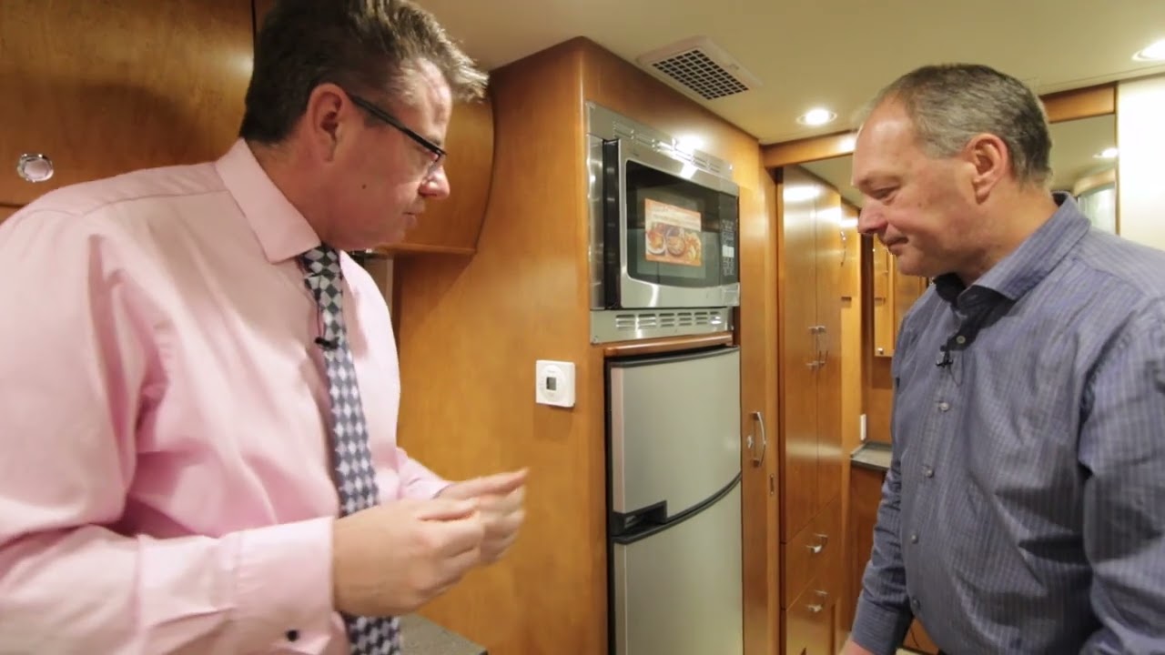Leisure Travel Vans Unity Galley Guide: Stove, Hot Water & Slide-Out Tips