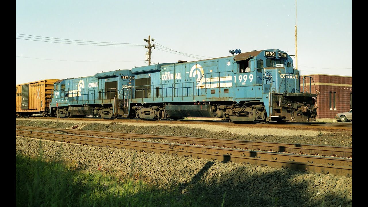 Conrail B23-7's smoking it up at Readville,MA 08/21/1992