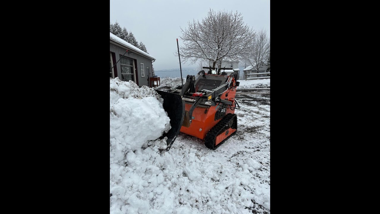 Heavy Wet Snow, Can the Mini skid steer do it?!