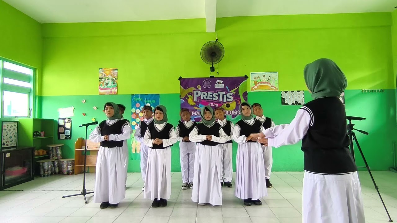 PADUAN SUARA KELAS 4 DALAM AJANG PRESTIS 2026 MI MAZRA'ATUL ULUM 01