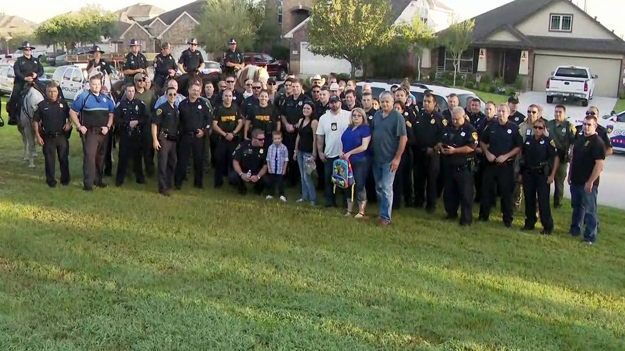 HPD officers walk fallen officer's son to first day of kindergarten