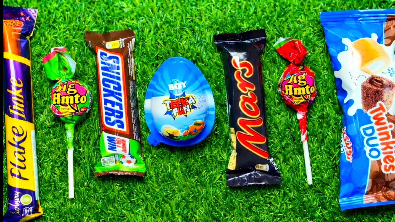 Most Asmr popular candys some lots of colorful rainbow lollipop candy unpacking chocolate eat