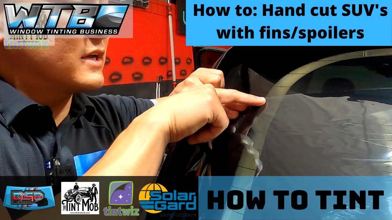 How to hand cut an SUV back window with fins