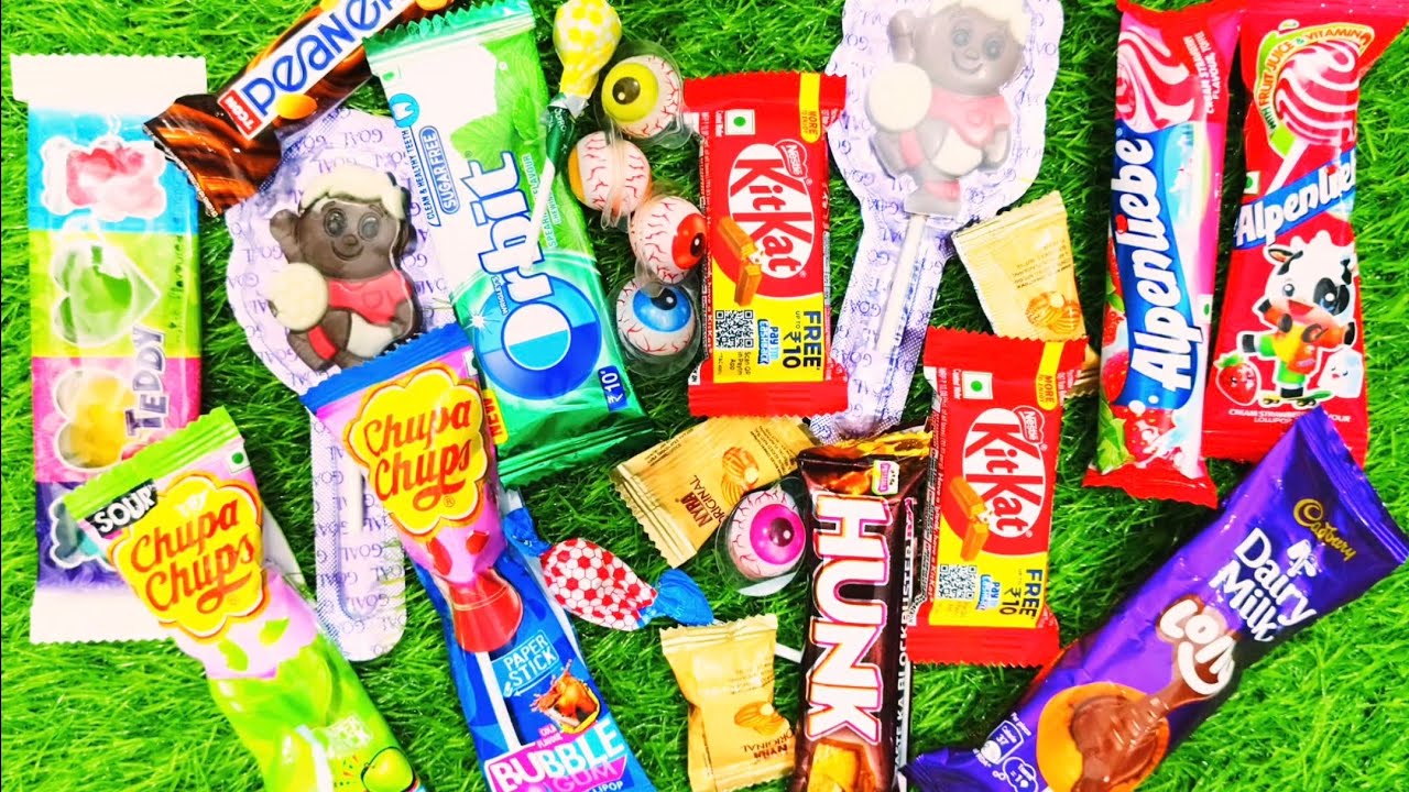 Chocolate Video ASMR  Popular Candys / some lots of colorful rainbow lollipop / unpacking chocolate 