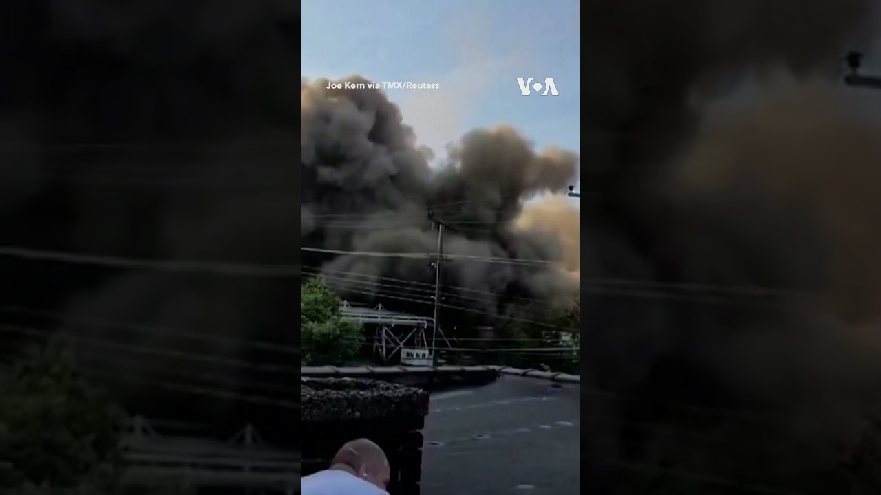 Chimney Implosion Creates Giant Dust Cloud #shorts | VOA News