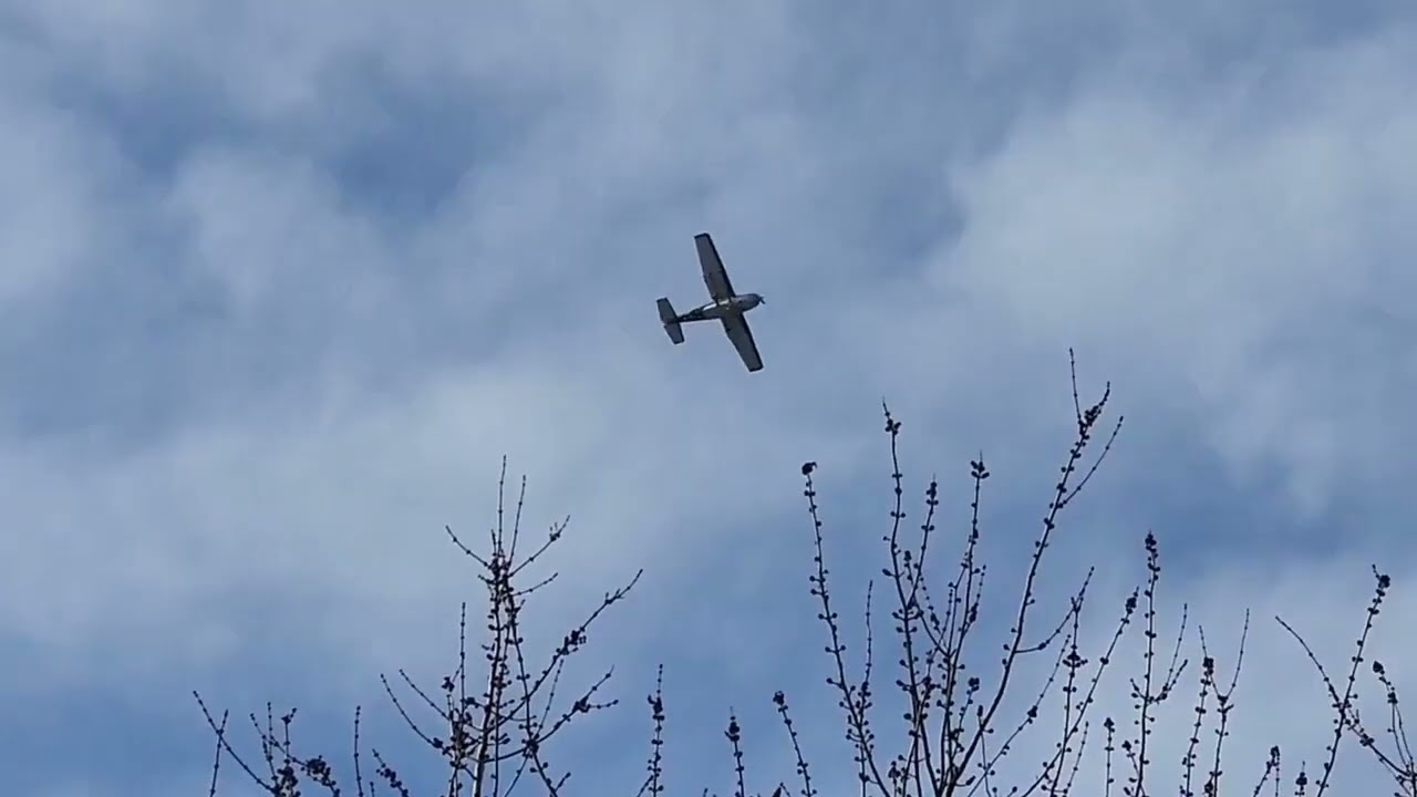 State Police CESSNA 182T circling my property