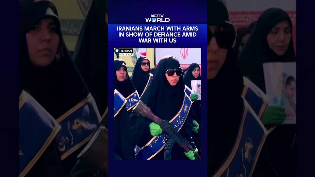US Iran War News | Hundreds Of Iranians March While Carrying Arms In Show Of Defiance Amidst War