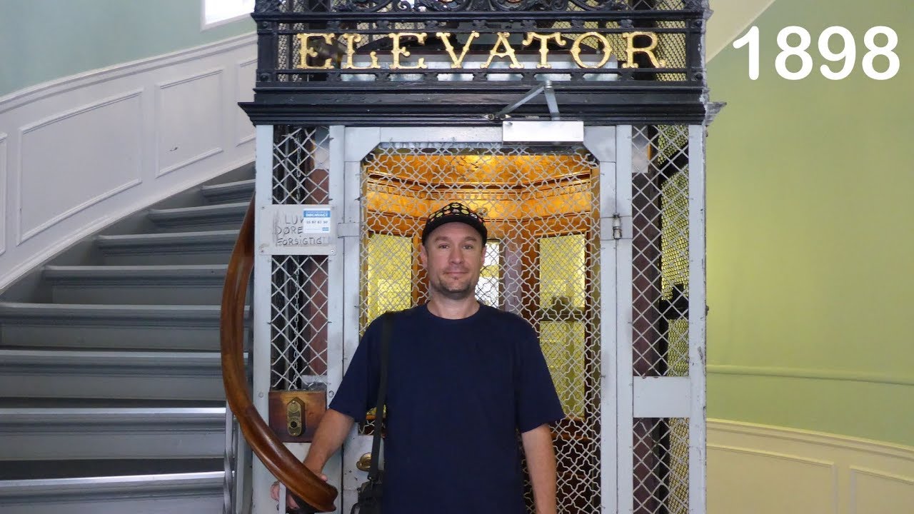 Amazing 1898 Titan elevator in Copenhagen Denmark with terrible inner door