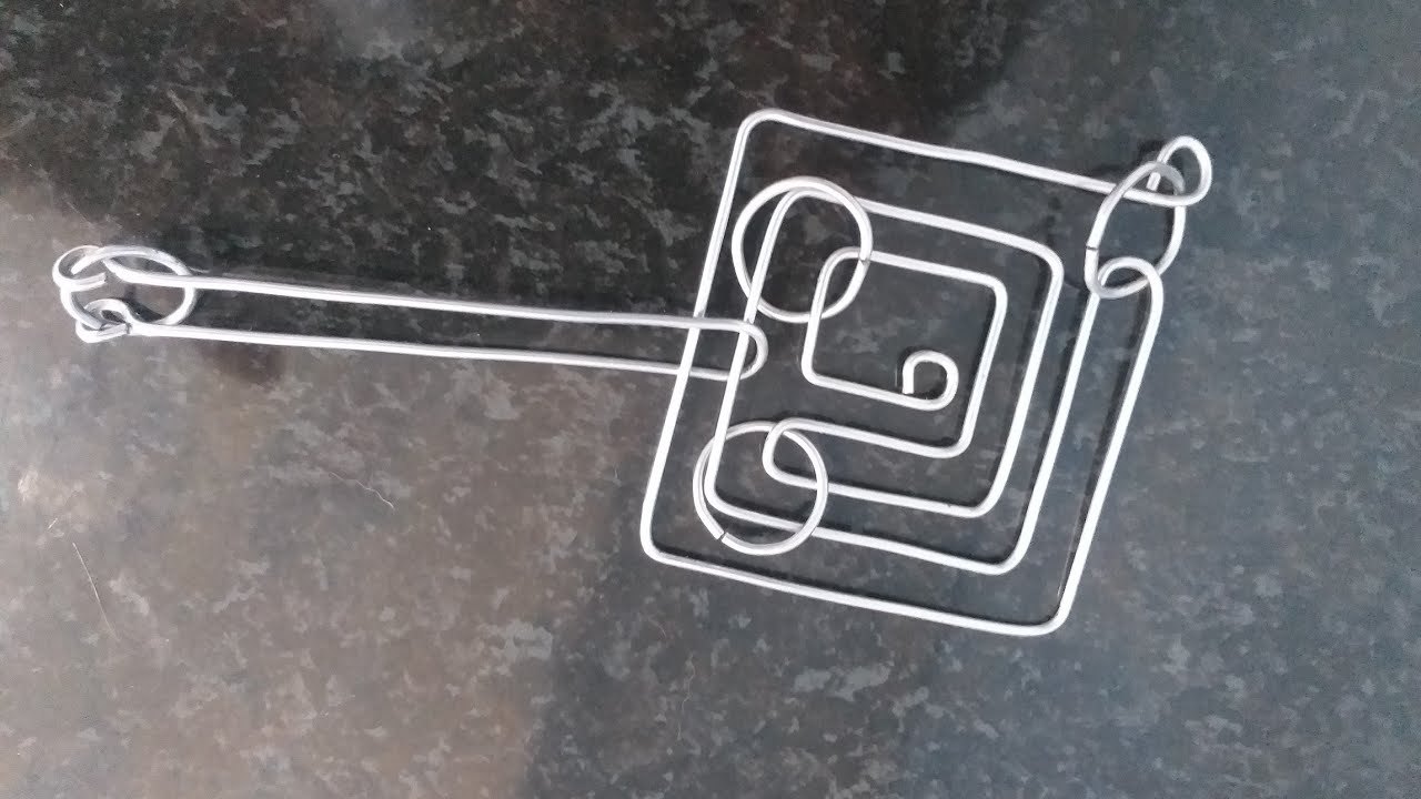 veja esse quebra cabeça de arame