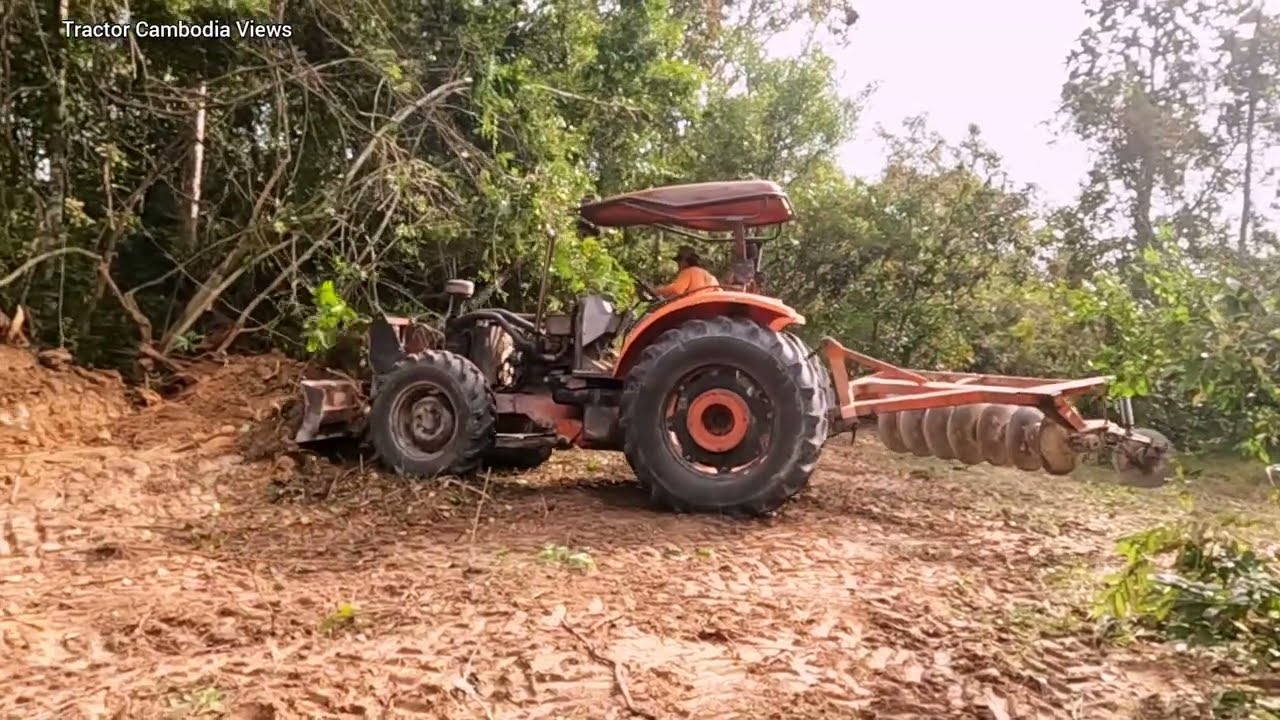 Watch Tractor Kubota M104S Pull and Cut Forest!