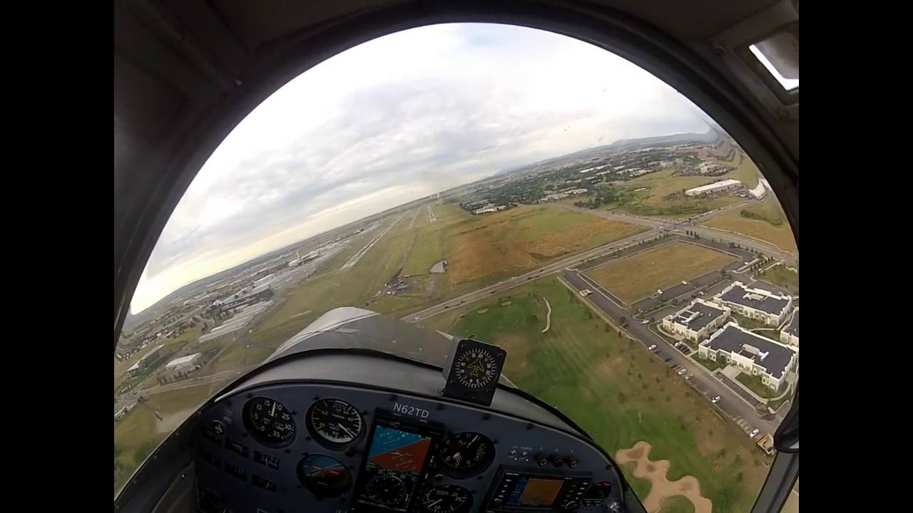 Derek Flying aircraft 2150A Varga locally in the skies above Southwest Denver