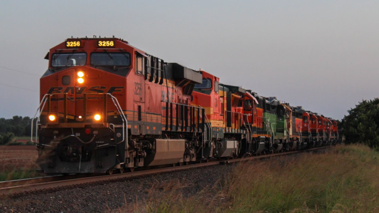 BNSF3256 leads D-OKCTUL in Guthrie OK, Ft B40-8W, BN Paint GP30 and a Yellowbonnet GP38U