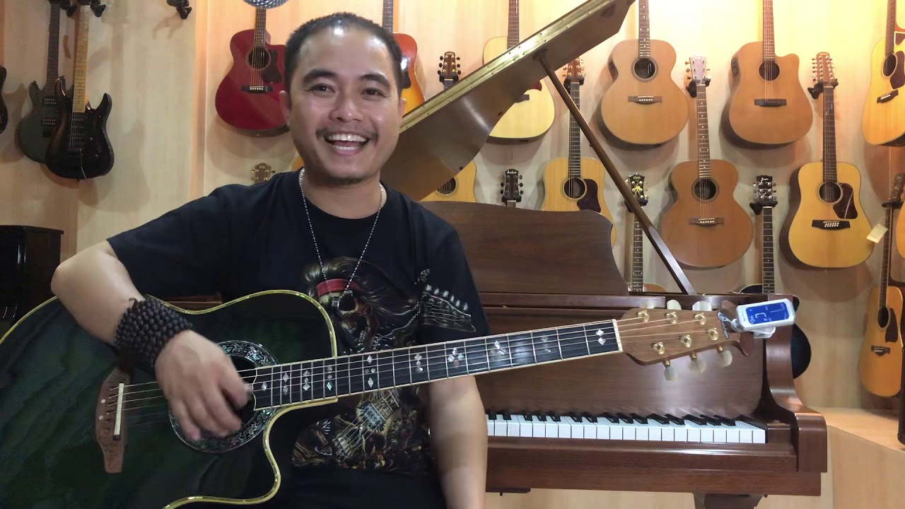 ( រៀនហ្គីតា ) របៀបរឹតខ្សែហ្គីតា ដោយលោក សំរិទ្ធីយ៉ា ( Learning guitar ) How to tune guitar