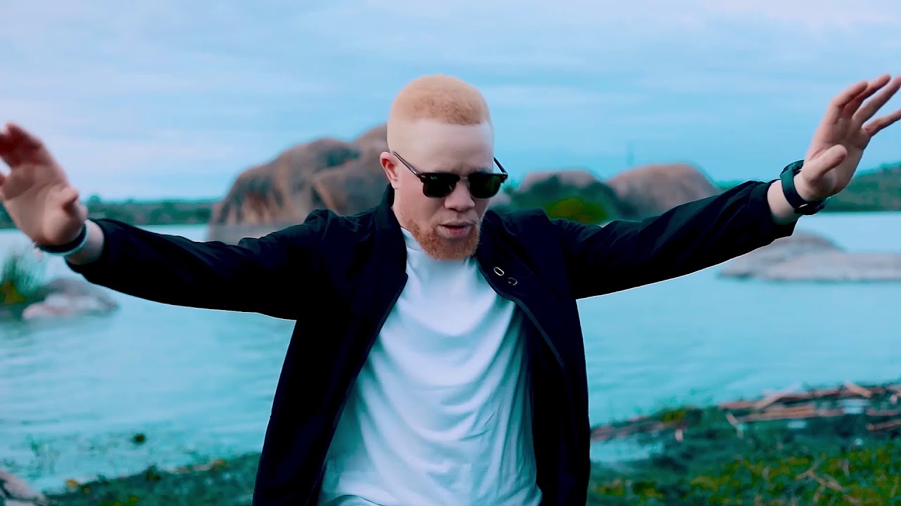John Migila - Dancing On The Grace (Official Video) Feat. Linex Sunday