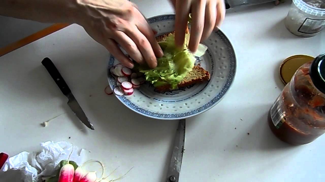 Danish lunch with smoked cheese salad and herring.