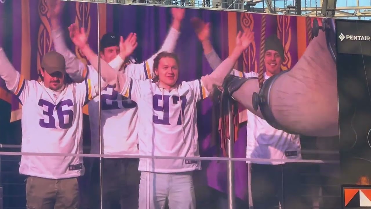 Kirill Kaprizov leads the SKOL Chant for the Minnesota Vikings and blows the Gjallarhorn