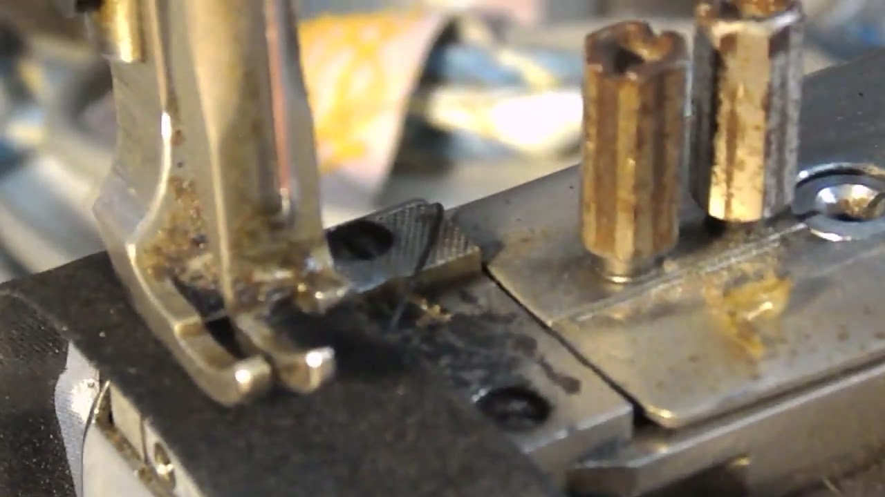 Mitsubishi CU 865, cylinder arm needle feed with walking and gripping foot.