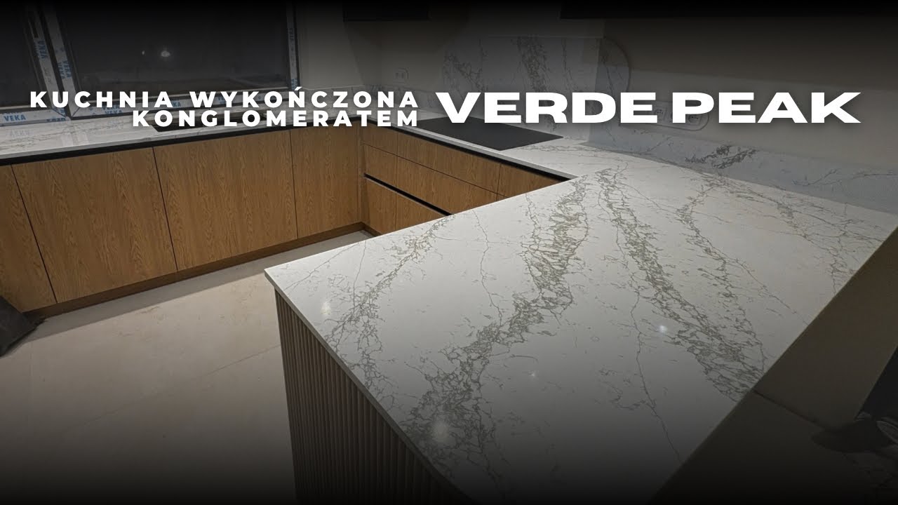 Wykończenie kuchni blatami i okładzinami z konglomerat Verde Peak