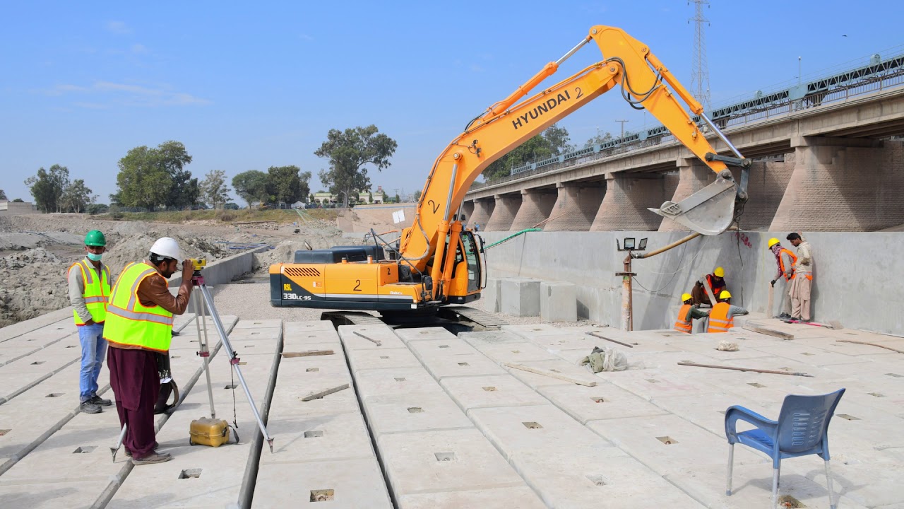 Construction of punjnad barrage  Ramzan and sons  pvt. Ltd