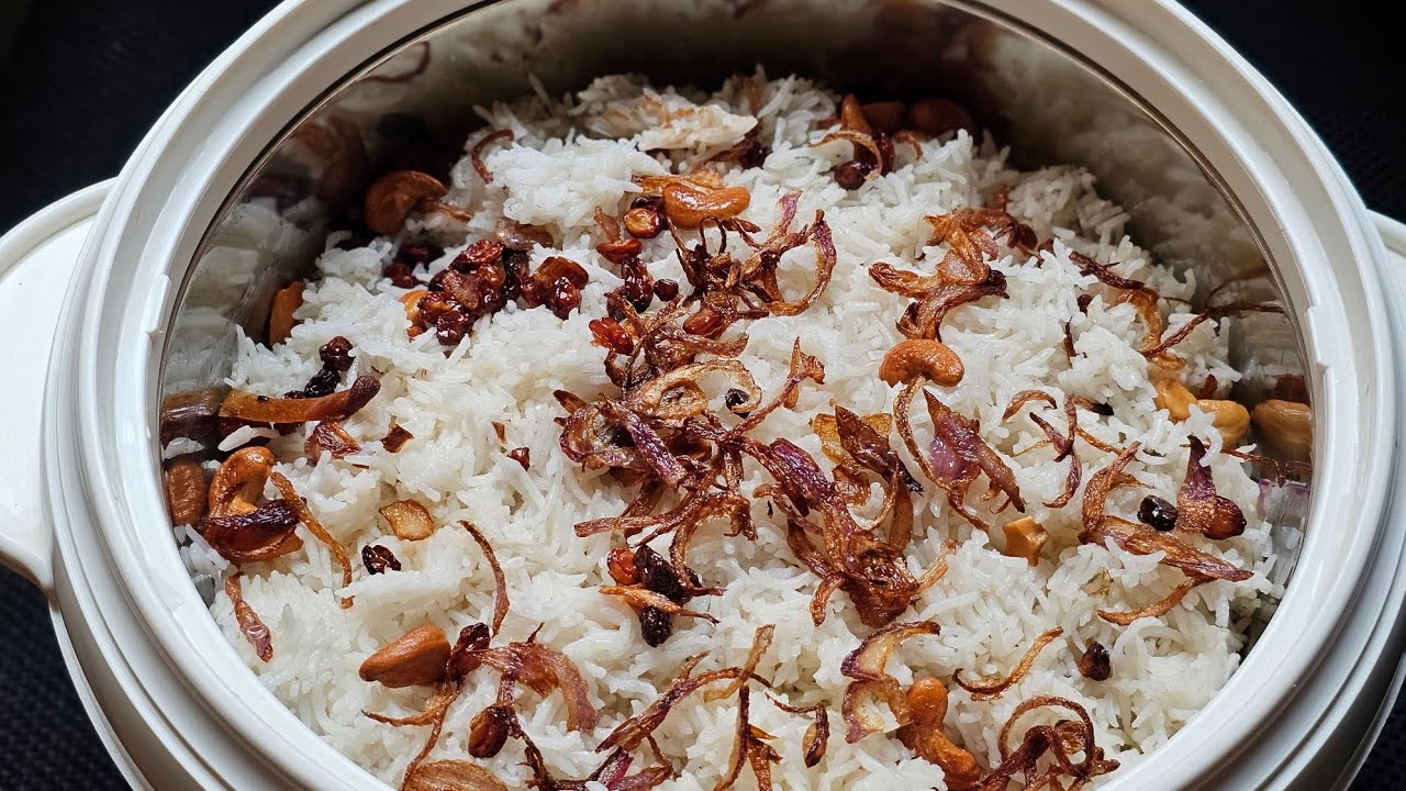 Ghee rice II നെയ്ച്ചോറ് | Ghee Rice Recipe II Easy Malayalam Recipe II Malabar Style