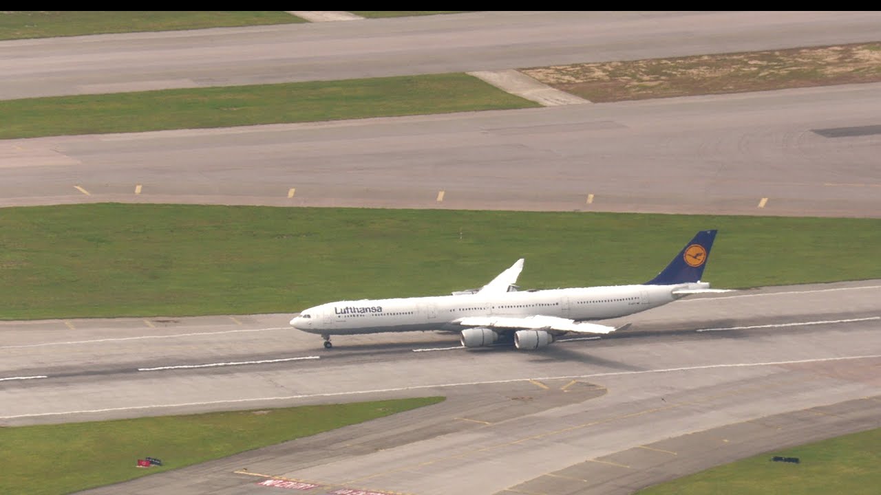 Lufthansa A340-600 Landing Hong Kong Airport VHHH on the rare side