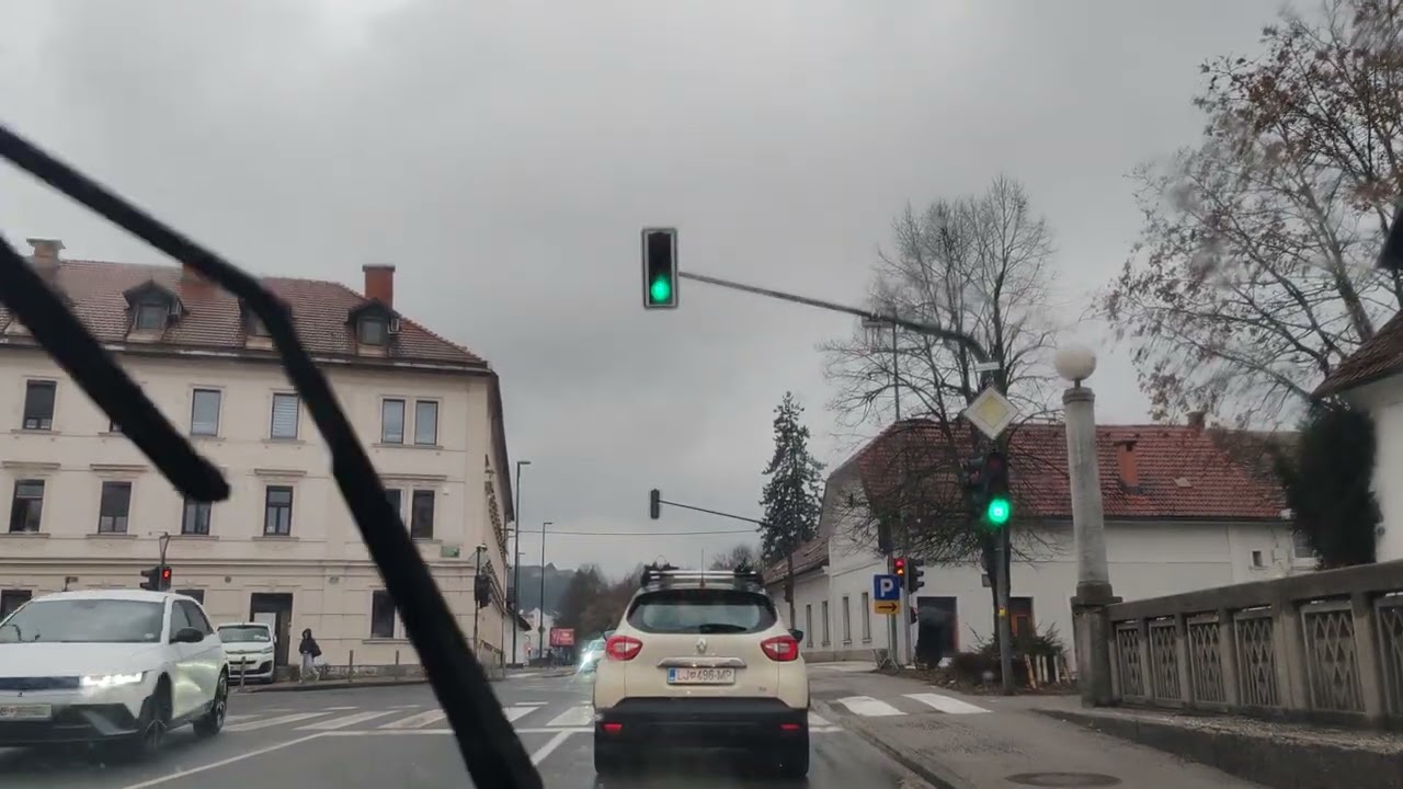 Prometni utrinek po deževni Ljubljani 