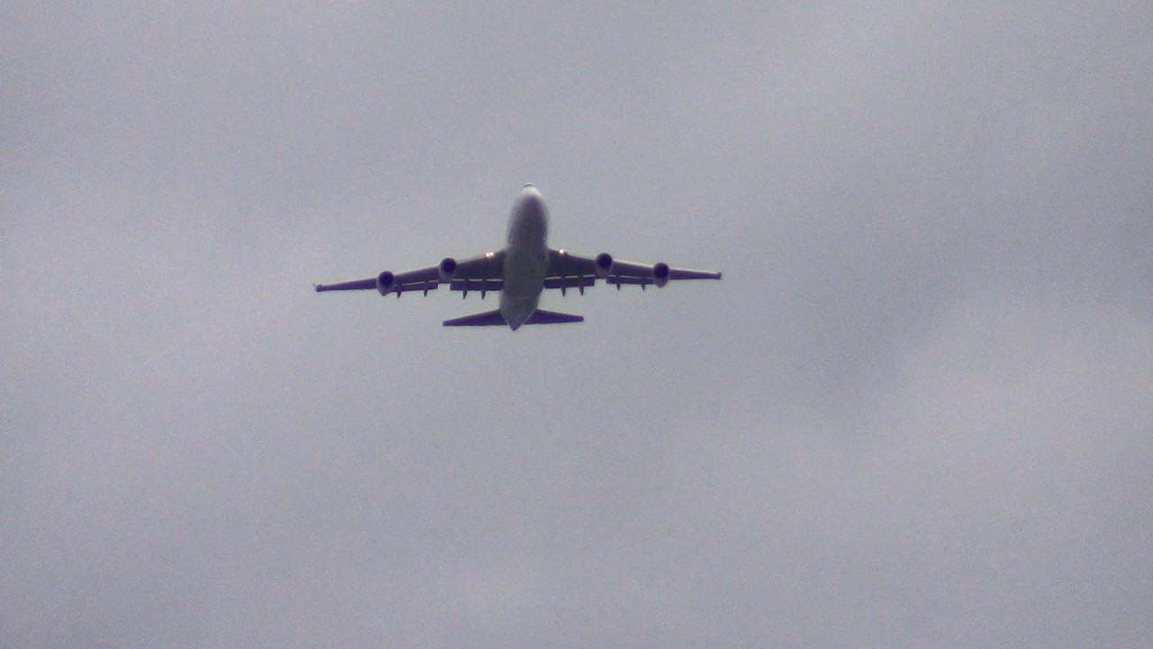 Cargo Boeing 747 taking off from JFK into clouds by jonfromqueens