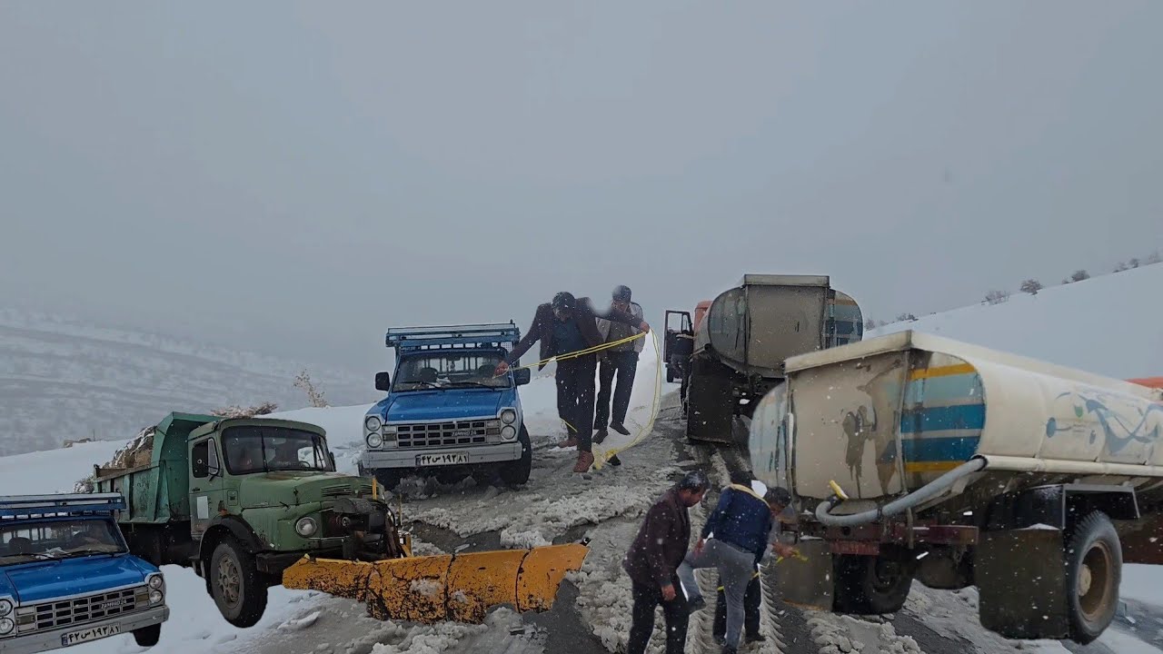 Between snow and blizzard; getting stuck in a snowstorm and unexpected rescue with water tankers!