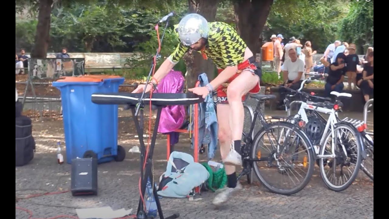 Disco Ball Helmet Guy (aka @Synthpoptroubadour) performing 