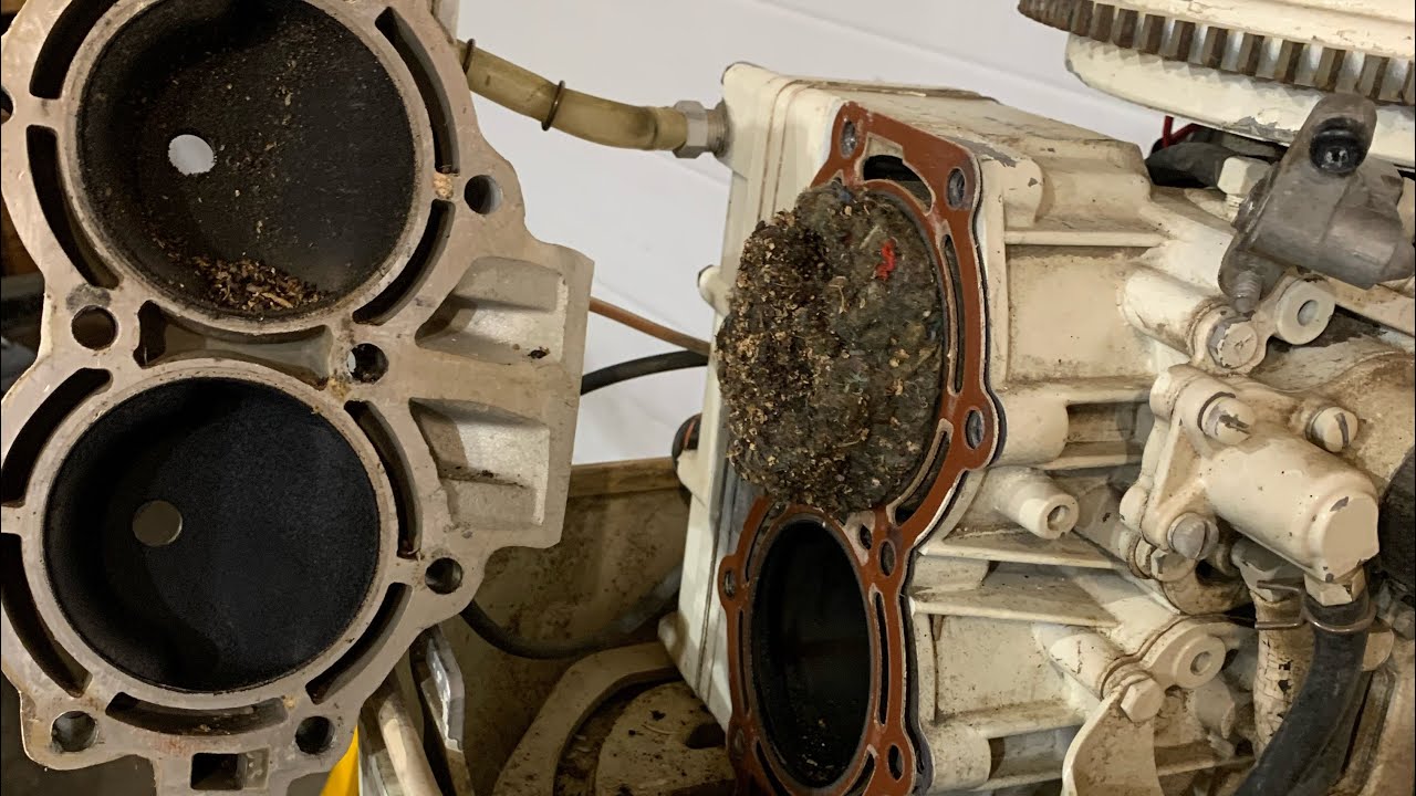 Points swap,Gap and flywheel removal on a 55HP Chrysler 2 stroke outboard motor how to video!