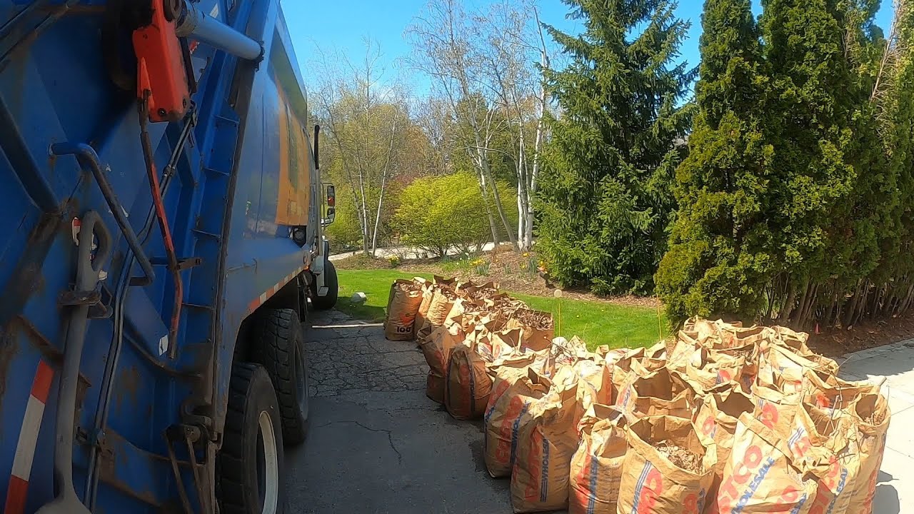 POV Yard Waste Mcneilus Rear Loader - Early Spring piles
