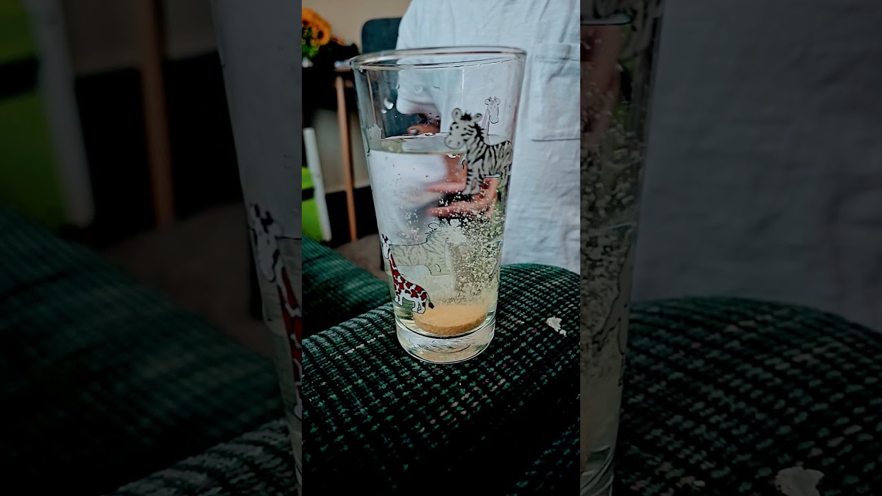 Slow dissolving vitamin C in water #SlowMotion #Vitamins #HealthVideo #WaterGlass #DailyRoutine