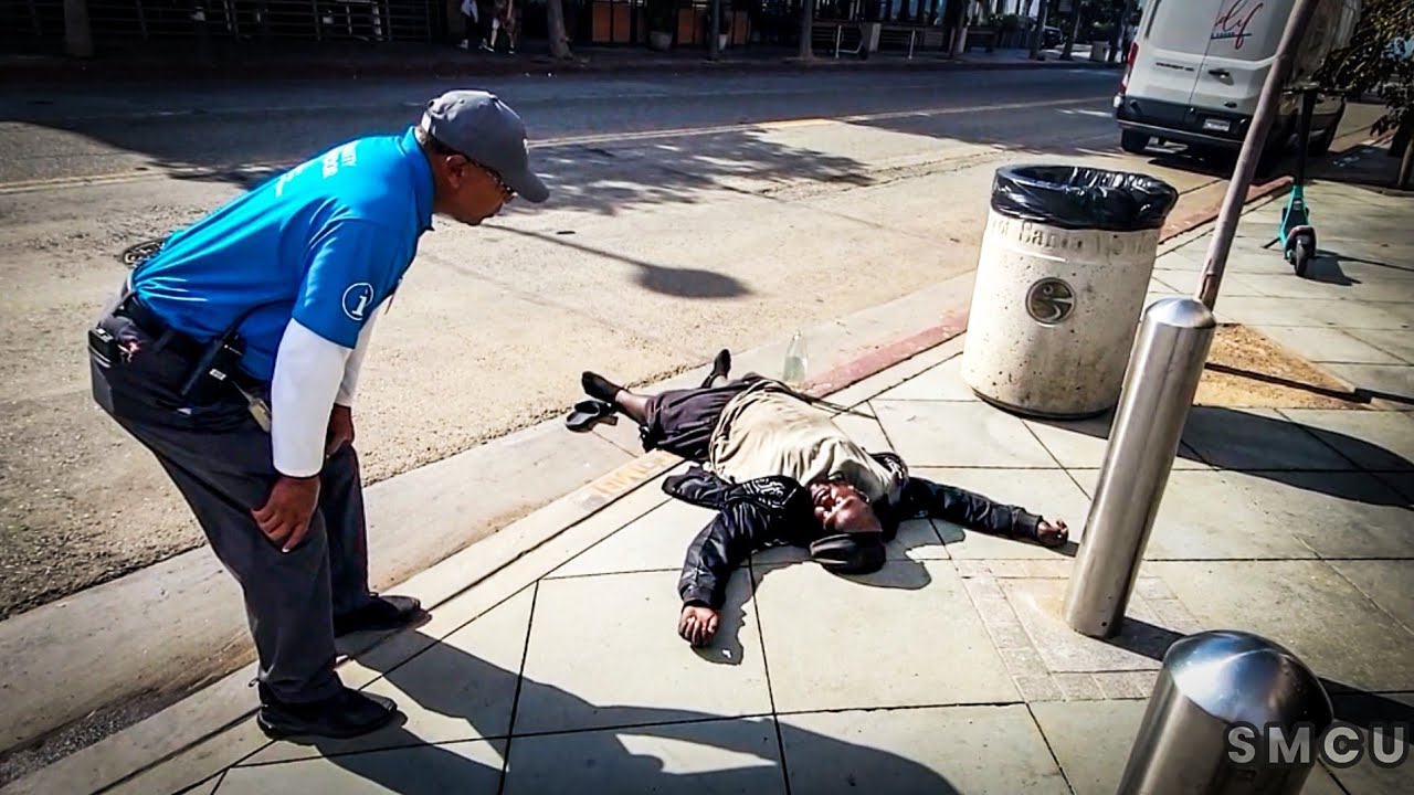Santa Monica Ambassadors Avert Street Hazards While Assisting a Passed-Out Man Laying in Gutter