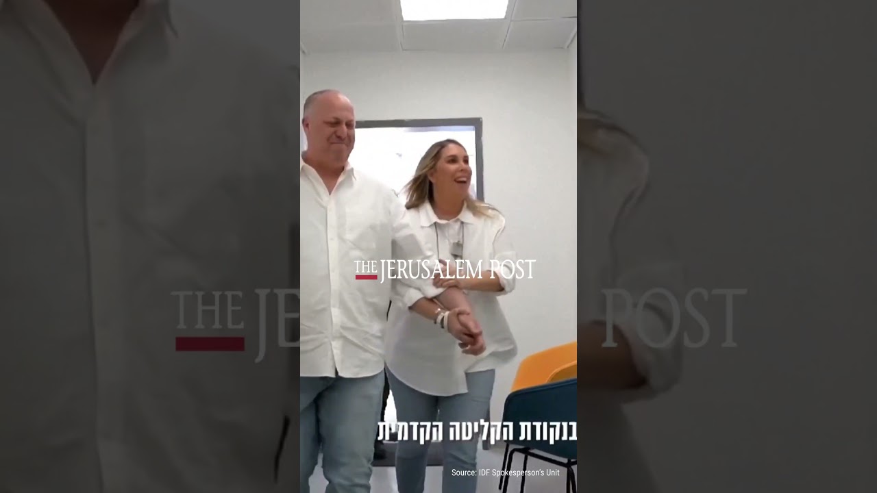 Released hostage Agam Berger breaks down in tears as her parents embrace her